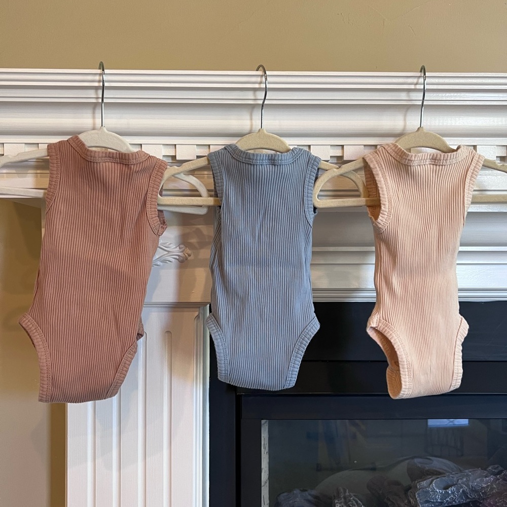 Gender neutral tank onesies with button detail. - Picture 2 of 2